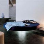 Bedroom,Apply Beautiful Floating Bed Design Inspiration With New Model Round Shape Plus Rounded Mattress On Combined Blue Color And Gorgeous Black Tile Also Cool Cream Lighting ,Pleasured Floating Bed Ideas