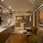 Apartments,Cool Amazing Small Space Studio Apartment Interior Design Inspiration With Wonderful Brown Fabric Sofa And Nice Open Plan Kitchen Plus Wonderful Tv Wall Units Also Gorgeous Long Bookshelf,Extraordinary Studio Apartment Interior Designs
