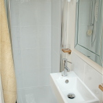 Furniture,Captivating White Themed Shower Design Small Bathroom With Adorable Glass Sliding Door Shower And Elegant White Ceramic Vessel Sink Plus Beautiful Chrome Faucet Also Cool Wall Mirror,Modern Shower Designs Small Bathrooms