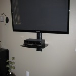 Furniture,Picturesque Flat Screen Tv Wall Design Ideas With Gorgeous Black Large Tv Wall Unit And Beautiful Gray Wall Paint Also Nice Brown Wood Floor ,Stunningly Beautiful And Modern Flat Screen Tv Wall Designs