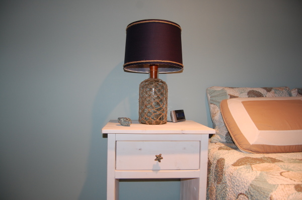 Interior,Enchanting Blue Wall Painted Cool Looking Lamp Design Inspiration With Charming Purple Shade Desk Lamp And Nice Over White Wooden Bedside Table On Combined Single Drawer Bedside Also Beautiful Floral White Cover Bedding Plus Soft Pillows For Bedroom ,Style Cool Looking Lamps