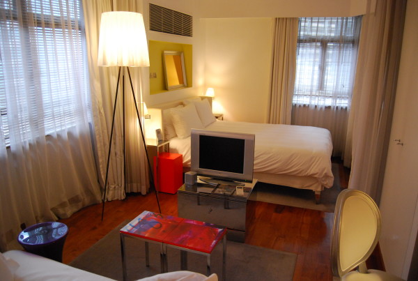 Apartments,Enthralling Small Space Furniture For Apartment Design Ideas With Comfortable White Bed Cover Combined Soft White Fabric Pillows And Gorgeous Cream Drum Tripod Floor Lamp Also Beautiful Large White Transparent Curtains For Bedroom,Cheap Furniture For Apartments Decoration Modern
