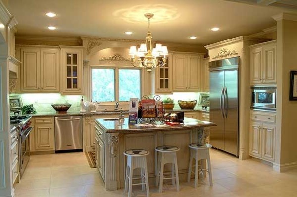 Interior,Exceptional White Themed Small Luxury Kitchen Design Ideas With Charming White Wood Kitchen Cabinet Plus Spacious White Kitchen Island And Comfortable Three White Wood Bar Stool Also Gorgeous Chandelier,Best Small Luxury Kitchens Inspiration