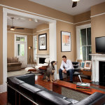 Apartments,Enticing Beige Mixed White Wall Paint Bachelor Apartment Design Ideas With Awesome Black Leather Sofa And Nice White Mantel Fireplace Plus Gorgeous Brown Wood Narrow Table Also Soft Gray Area Rug On Combined Trendy Brown Wooden Flooring ,Exceptional Bachelor Apartment Designs