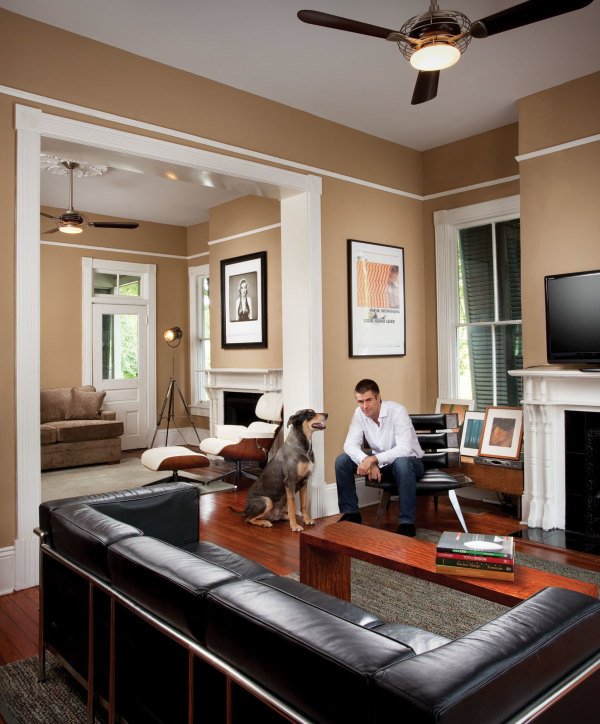 Apartments,Enticing Beige Mixed White Wall Paint Bachelor Apartment Design Ideas With Awesome Black Leather Sofa And Nice White Mantel Fireplace Plus Gorgeous Brown Wood Narrow Table Also Soft Gray Area Rug On Combined Trendy Brown Wooden Flooring ,Exceptional Bachelor Apartment Designs