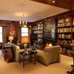 Apartments,Enthralling Brown Scheme Manhattan Penthouse Apartement Design Ideas With Stylish Beige Leather Sofa And Cool Dark Brown Wood Square Accent Table Also Nice Large Bookcase For Living Room,Manhattan Penthouse Apartments