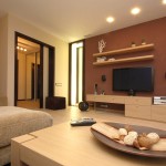Interior,Enticing Interior Designer Living Room Design Ideas With Cool Bright Brown Wood Entertaiment Center And Beautiful Bright Brown Wood Wall Mount Shelf On The Brown Wall Also Nice Bright Brown Wood Coffe Table,The Best High Quality And Cheap Interior Designer Living Rooms