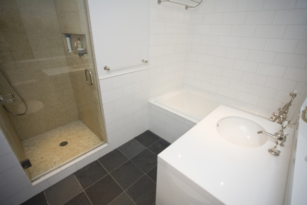 Bathroom,Unusual White Ceramic Tile Wall Best Small Bathroom Design Inspiration With Charming White Ceramic Free Standing Bathtub On Combined Trendy Black Stone Tile Floor And Beautiful White Marble Countertop Plus Cool Chrome Bathroom Faucet Also Modern Shower Enclosures,Picturesque Best Small Bathroom Designs
