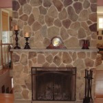 Interior,Affordable Gray Stone Fire Places Design With Beautiful Black Wood Fireplace Candle Stands And Trendy Brown Wood Floor,The Beauty Of Stone Fire Places Your Home Inspiration