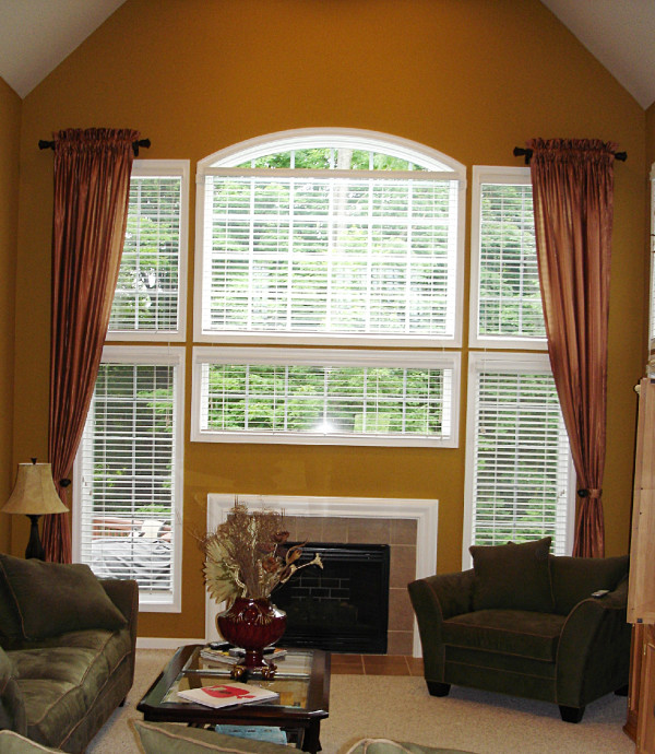 Interior,Unusual Beige Wall Paint Large Window Curtain Ideas With Charming White Wood Window Frame And Stylish Fireplace Also Comfortable Black Single Seater Sofa Plus Cool Glass Table,Good Large Window Curtain Ideas