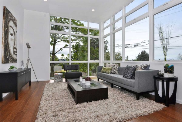 Living Room,Impressive Style Area Rug Living Room Inspiration With Modern Laminate Flooring And Unique Table Also Two Beautiful Sofa,Modern Style Area Rugs For LIving Room