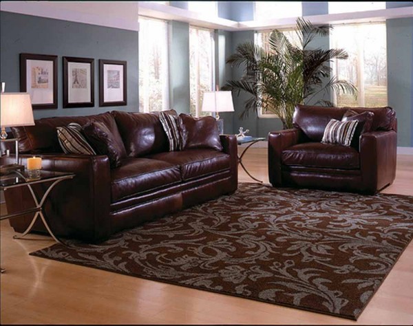 Interior,Cool Stunning Sofa On Combined Brown Color And Nice Pillow Also Marvelous Brown Huge Area Rug Design Ideas With Floral Ornamental,Impressively Huge Area Rugs Design Ideas