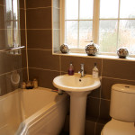 Bathroom,Picturesque Small Space Bathroom 2011 Design Inspiration With Cool Corner White Ceramic Bathtub And Wonderful White Ceramic Pedestal Sink Also Comfortable White Ceramic Toilet,Perfect Bathrooms 2011 Design Modern