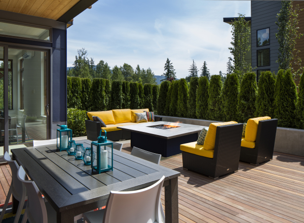 Exterior,Fabulous Indoor Outdoor Living Space Design Inspiration With Awesome Dark Brown Wicker Sofa In Beautiful Orange Seat Cushions And Cool Square French Quarter Fire Pit Table Plus Lid Also Trendy Brown Linen Wood Floor,Indoor Outdoor Living Spaces