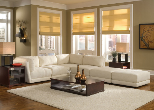 Furniture,Good Looking Furniture Small Space Design With Charming White Fabric Sectional Sofa And Beautiful Brown Wood Square Accent Table Plus Splendid Rectangular Dark Brown Wood Coffe Table Also Modern Large White Fur Rug On Combined Trendy Brown Laminate Flooring,Modern Living Room Design With Comfortable Furniture Small Spaces