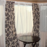 Interior,Marvelous Curtain Ideas For Large Window With Adorable White Curtain And Charming Beige Kid Curtain On Combined Black Pattern Also Nice Wood Round Accent Table In Dark Brown Color,Curtain Ideas For Large Windows
