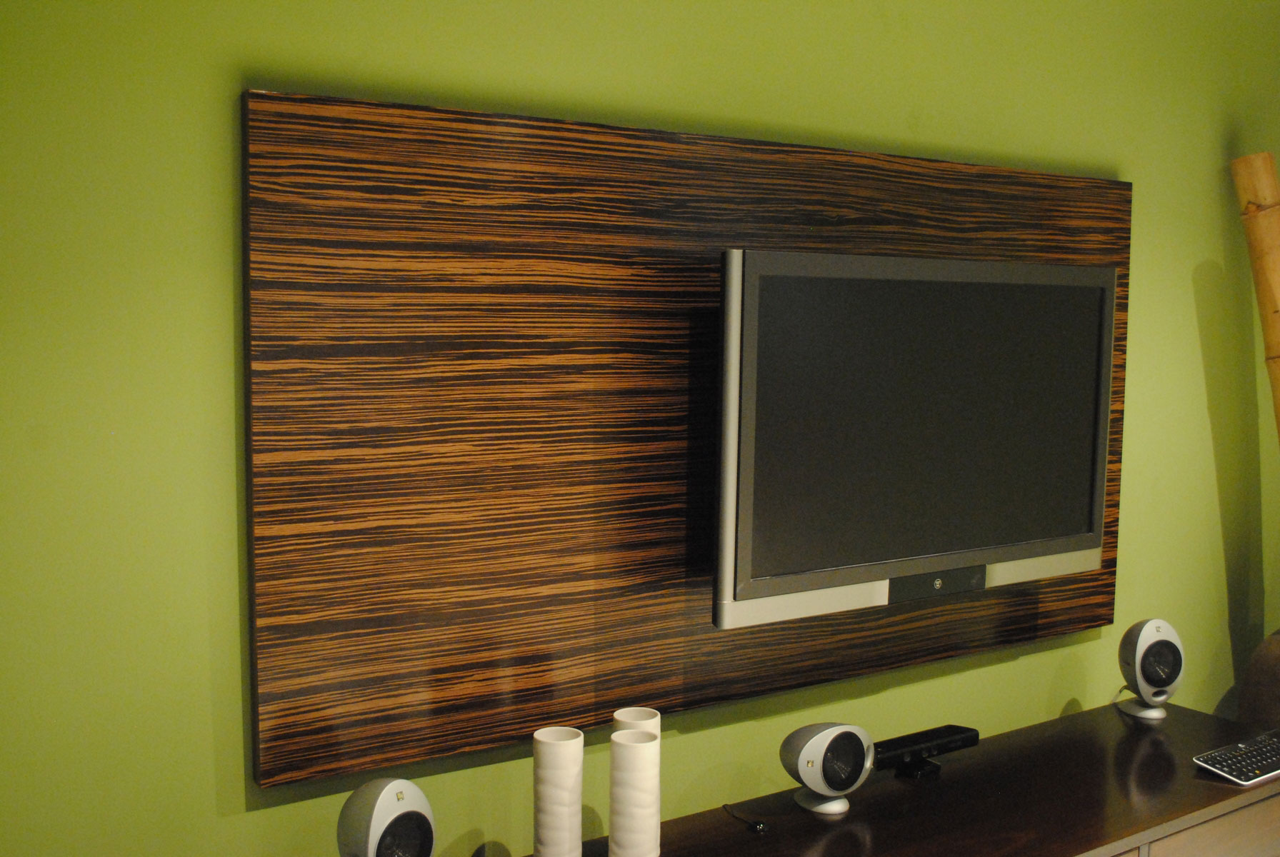 Furniture,Enthralling Green Wall Paint Flat Screen Tv Wall Design Ideas With Wonderful Brown Bamboo Wall Panel Plus Cool Tv Wall Unit And Beautiful Black Entertainment Center Also Wonderful Speakers,Stunningly Beautiful And Modern Flat Screen Tv Wall Designs