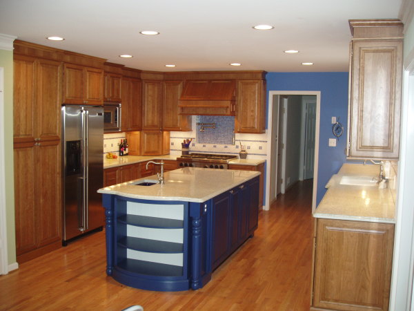Furniture,Splendid Blue Wall Paint Kitchen Island Design Ideas With Gorgeous White Black Kitchen Island On Combined Nice Brown Wood Floor And Contemporary Brown Wood Kitchen Cabinet Plus Trendy Brown Wood Floating Kitchen Cabinet Also Stunning Cream Ceiling Lamps,Modern Kitchen Island Designs