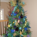 Furniture,Splendid Cream Wall Paint Xmas Tree Decoration With Beautiful Green Glass Ball Ornaments And Cute Having Blue Series Ribbon Flowers,Awesome Xmas Trees Latest For Christmas