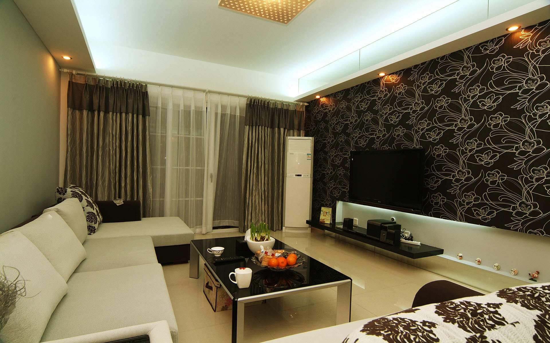 Furniture,Elegant Interior Design Ideas With Comfortable Broken White Leather Sectional Sofa And Nice Rectangular Black Table On Combined Cool Cream Ceramic Tile Floor Also Beautiful Tv Wall Units Plus Stylish Corner Portable Air Conditioner In White Color,Best Interior Design Ideas To Your Home