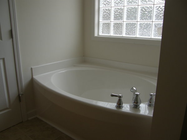 Bathroom,Cool Amazing Wall Light Design With Astonishing Glass Block Features White Wall Bath Panels And Charming White Ceramic Garden Bathtub Also Modern Stainles Faucet In Trendy White Porcelain Material,Classic Wall Lights Inside Bathroom