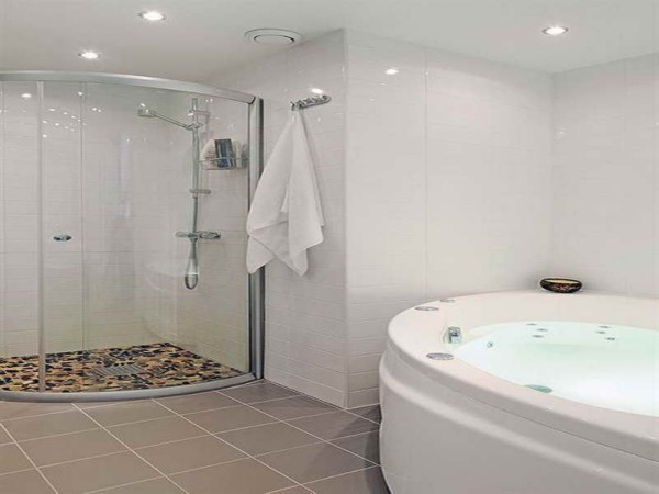 Bathroom,Adorable White Background Swedish Bathroom Design Inspiration With Unusual Corner Shower Enclosures And Comfortable Huge Round White Ceramic Bathtub Also Nice Gray Ceramic Tile Floor,Swedish Bathroom Design Modern