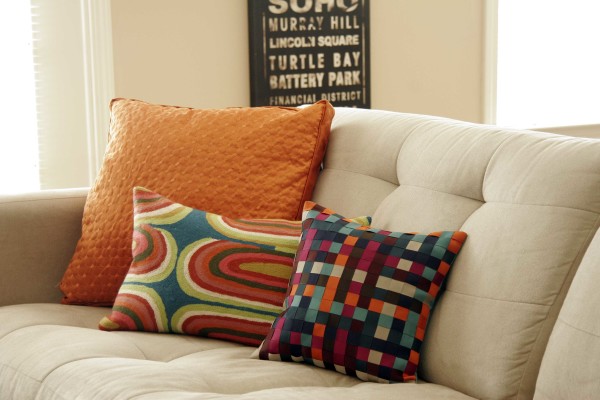Furniture,Admirable Cream Wall Paint Decorative Pillows For Couche With Modern White Fabric Sofa And Soft Three Pillow Also Nice White Wood Window Frame,Cute And Pretty Decorative Pillows For Couches