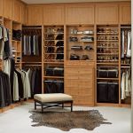 Furniture,Amazing Walk In Wardrobe Design With Unusual Bright Wood Walk In Wardrobe And Cool Open Shoes Shelves Plus Gorgeous Bright Wood Drawers Also Soft Cream Cushion Ottoman On Combined Trendy Leo Pard Pattern Cowhide Rug,Cool Amazing Some Walk In Wardrobe Designs