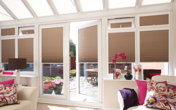 Interior,The Best Large Glass Door With Beautiful Pleated Blind On Combied Brown Color Also Cozy White Sofa And Cool Floral Pillow For Modern Concept,Gorgeous Pleated Blinds Decor Ideas