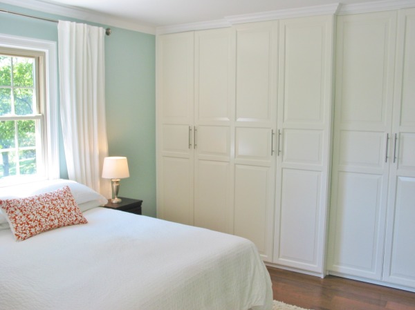Bedroom,Romantic Light Blue Wall Paint Ikea Bedroom Closet Design Ideas With Beautiful White Bed Sheet And Gorgeous White Wood Closet Also Cool Black Wood Nightstand Table On Combined Trendy Table Lamp,Trendy Furniture Ikea Bedroom Closets