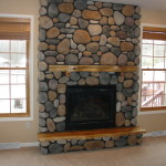 Interior,Admirable Indoor Stone Fire Places Decoration With Amazing Stone Fireplace And Beautiful Brown Wood Window Frame Plus Nice Brown Wood Blind Also Wonderful Bright Brown Wood Floor,The Beauty Of Stone Fire Places Your Home Inspiration
