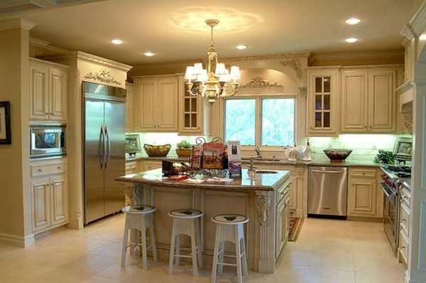 Furniture,Entrancing Large Space Design Of Kitchen Island With Gorgeous White Wood Freestanding Kitchen Cabinet And Beautiful White Wood Kitchen Island Combined Nice Black Marble Countertop Also Comfortable White Wood Bar Stools Plus Splendid Cream Kitchen Chandelier For Luxurious Concept,Best Classic Designs Of Kitchen Islands