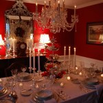 Dining Room,Dazzling Red Wall Paint Table Decoration For Christmas With Charming White Table Cloth And Romantic Candle Under Plus Beautiful Brightly On Cutlery Sets Also Awesome Over Hangging Chandelier,Splendid Dining Table Decorations For Christmas
