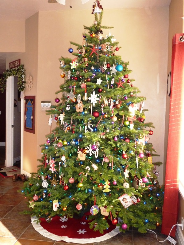 Furniture,Contemporary Christmas Tree Decoration With Wonderful Multicolor Ball Ornaments And Cool White Star Christmas Ornaments Also Beautiful Beige Wall Paint,Most Beautiful Christmas Tree