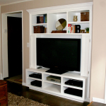 Furniture,Enticing Pink Wall Paint Flat Screen Tv Wall Design Ideas With Charming White Built In Entertainment Center Plus Cool Open Shelves And Modern Black Large Tv Stand Also Gorgeous Brown Wood Stairway ,Stunningly Beautiful And Modern Flat Screen Tv Wall Designs