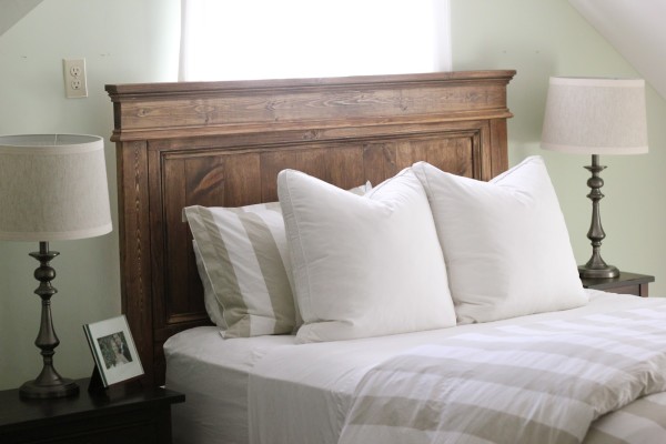 Bedroom,Awesome Brown Wood Teak Headboard Design Ideas With Wonderful White Bed Sheet On Combined Soft White Fabric Pillows And Beautiful Brown Wood Nightstand Tables Plus Gorgeous White Drum Table Lamps Also Nice White Wall Paint,Comfortable Bed With Headboard Designs