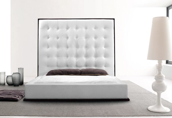 Bedroom,Modern Height White Leather Headboard Design Inspiration With Stylish White Bed Sheet And Beautiful Black Transparent Jars Also Modern White Cup Floor Lamp Using Gorgeous White Wall Paint,Comfortable Bed With Headboard Designs