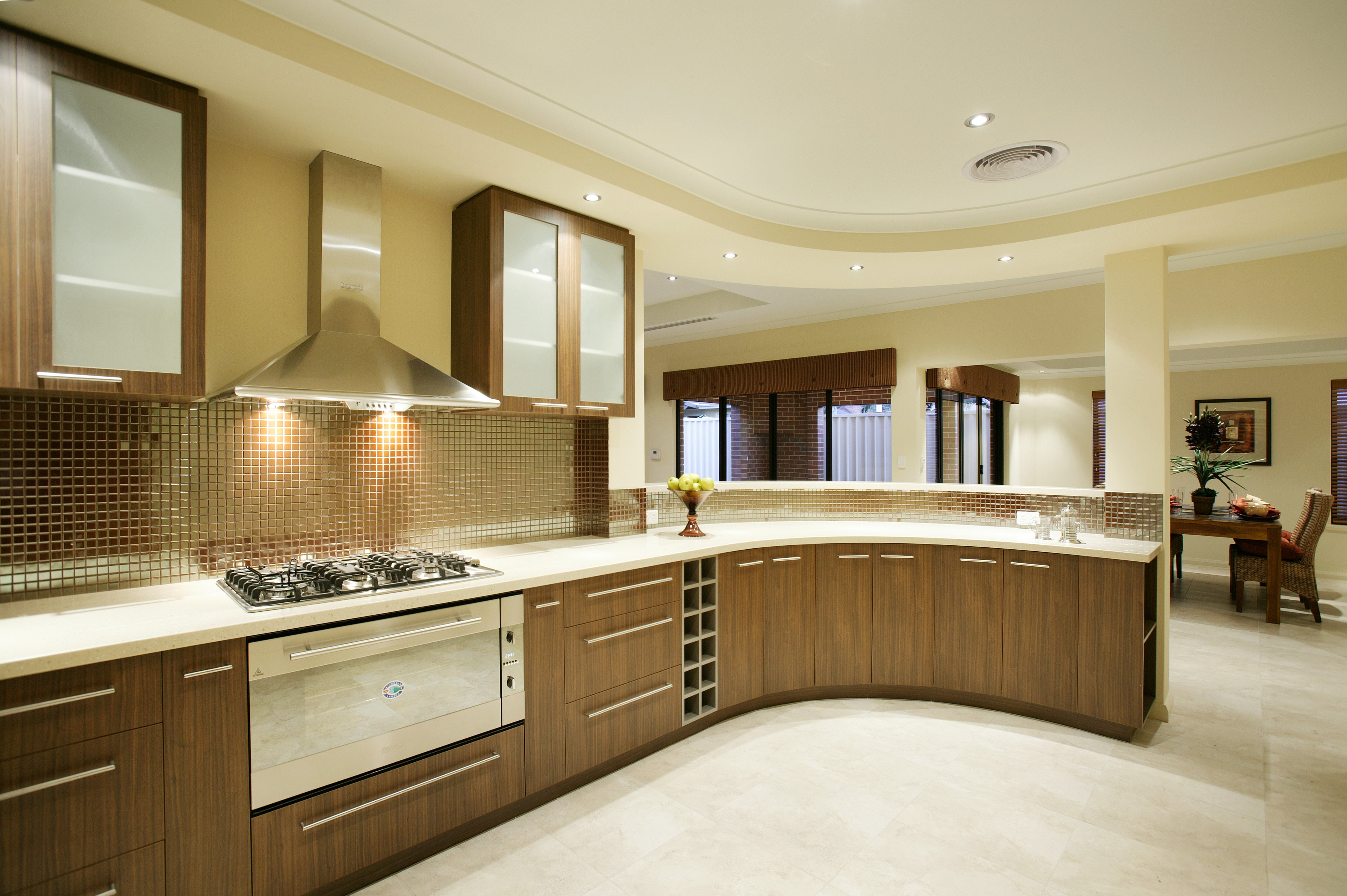 Furniture,Enchanting Interior Design Design With Cool Curved Shape Kitchen Cabinet In Beautiful Brown Wood Material And Exquisite Stainless Cooker Hood Also Picturesque Floating Frosted Glass Door Kitchen Cabinet,Affordable Interior Design Design For Your Home