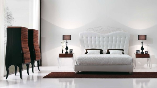 Bedroom,Awesome White Wall Paint Small Designer Bedroom With Fabulous White Bed Frame On Combined Soft White Bed Sheet And Cool Large White Leather Headboard Plus Exquisite White Brown Wood Bedside Tables Also Unique Height Cabinet In Brown Black Color For Luxurious Concept,The Best Modern Small Designer Bedrooms