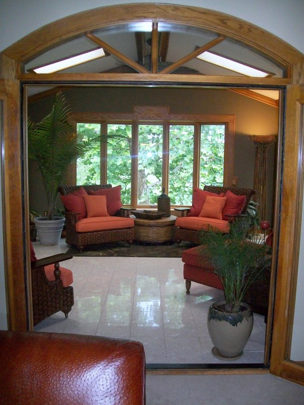Interior,Classic Sunroom Design With Indoor Plant Decoration Ideas And Comfortable Brown Rattan Chairs In Red Padded Seat Also Beautiful White Ceramic Floor For Living Room ,Indoor Plant Decoration Ideas