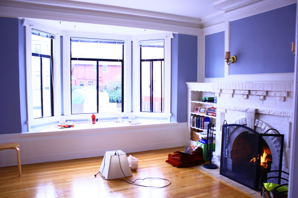 Furniture,Exquisite Purple Wall Paint Bay Window Decorating With Amazing Black Wood Window Frame And Cool Glass Windows Plus Gorgeous Fireplace Also Nice Brown Laminate Flooring,Contemporary Bay Window Decorating
