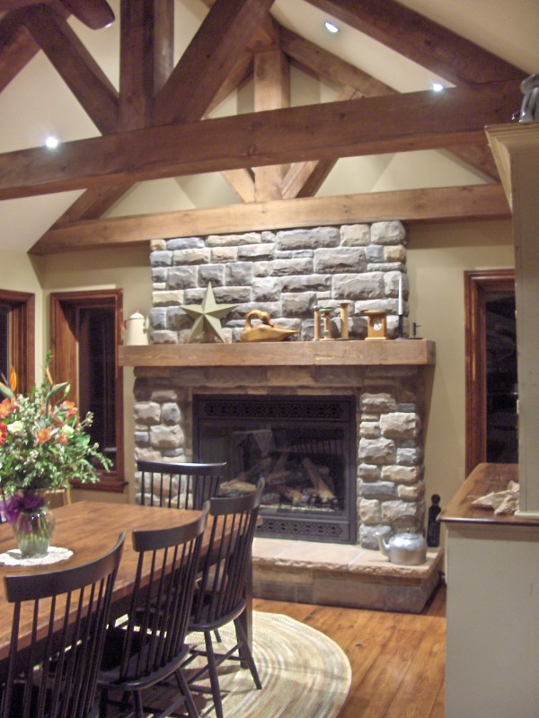 Interior,Dazzling Cream Wall Paint Stone Fire Places Decoration With Beautiful Gray Brick Stone Fireplace Plus Nice Brown Wood Wall Mount Shelf And Cool Rectangular Brown Wooden Dining Table Combined Beautiful Flower Vase Also Comfortable Black Wooden Dining Chairs,The Beauty Of Stone Fire Places Your Home Inspiration
