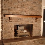 Interior,Admirable Cream Wall Paint Stone Fire Places Design Ideas With Stunning Cream Stone Tile Fireplace And Nice Brown Wood Wall Mount Shelf,The Beauty Of Stone Fire Places Your Home Inspiration