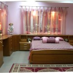 Furniture,Pretty House Interior Design Picture With Charming Brown Wood Bed Frame On Combined Soft Purple Bed Cover And Nice Brown Wood Vanity Table Plus Wonderful Wall Mirror On The Pink Wall Also Cool White Ceramic Tile Floor,Beautiful House Interior Design Pictures