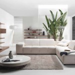Furniture,Modern Interior House Design Picture With Comfortable White Leather L Shape Sofa And Beautiful White Round Table On Combined Soft Gray Rug Also Wonderful Brown Wood Wall Mounted Shelves,Picturesque Interior House Design Pictures 2015