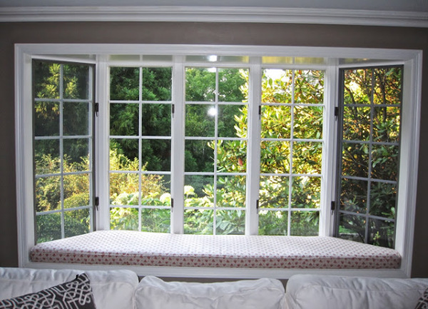 Furniture,Gorgeous Building A Bay Window Seat Design Ideas With Nice Glass Window And Beautiful White Wood Window Frame Also Soft Padded Seat In Red White Color,Comfort Building A Bay Window Seat Design
