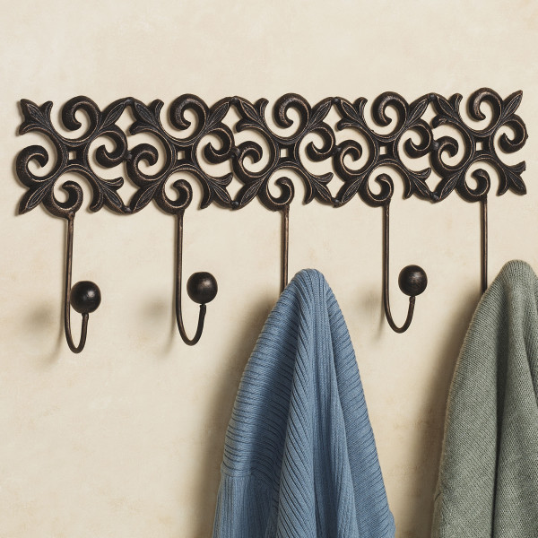 Interior,New Model Coat Hanger Decoration With Amazing Carving Wall Hook Rack Black And Soft Clothes Also Gorgeous Cream Wall Paint,The Best High Quality And Unique Coat Hangers