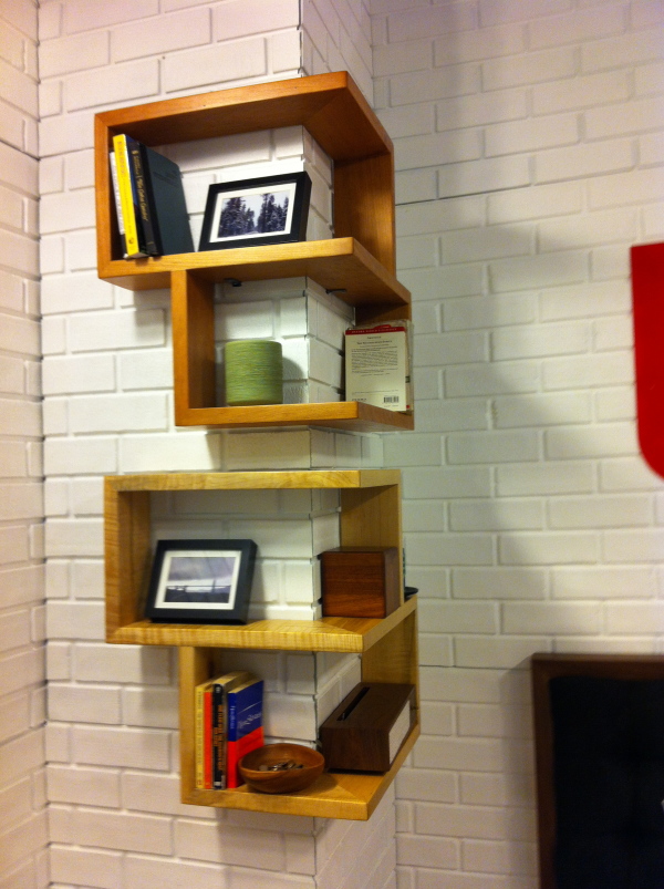 Furniture,Stylish Corner Shelving Unit Design Inspiration With Simple Unique Wooden Corner Bookshelves In Beautiful Bright Brown Color And Cool Picture Frames Also Rustic White Brick Stone Wall,Creative And Unique Shelving Units