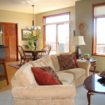 Furniture,Wonderful Cream Wall Paint Sofa For Small Living Room Design Inspiration With Comfortable Light Brown Fabric Sectional Sofa On Combined Soft Gray Rug And Charming Brown Oval Wood Table Also Cool Open Plan Dining Room ,The Most Convenient Sofas For Small Living Rooms