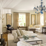 Furniture,Dazzling White Wall Paint Sitting Room Design Ideas With Charming Corner Sofa In Beautiful White Color And Comfortable White Leather Lounge Sofa On Combined Cool White Great Area Rug Plus Beautiful Fire Pit Also Amazing Blue Glass Chandelier,Some Fancy Sitting Rooms